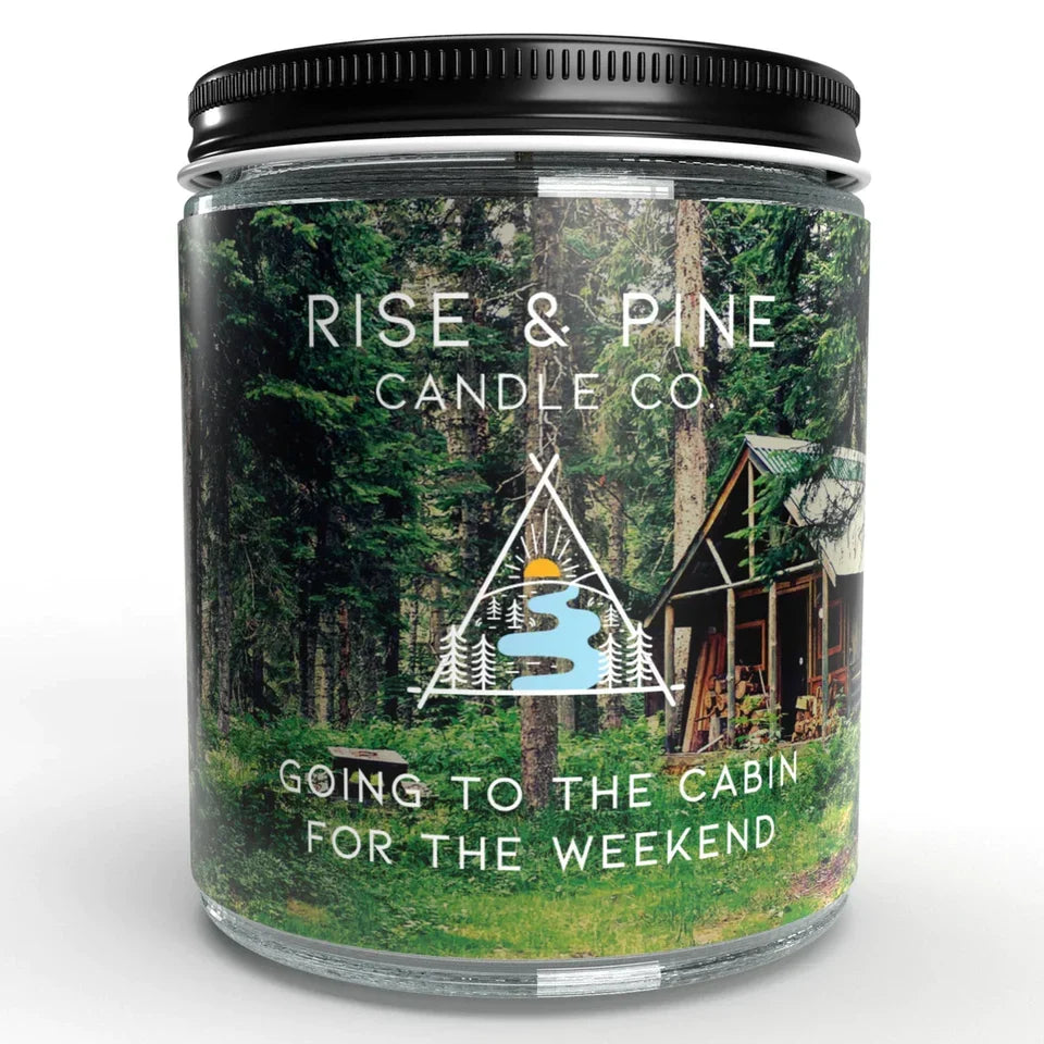 9 oz soy wax candle in clear glass jar with Rise & Pine label