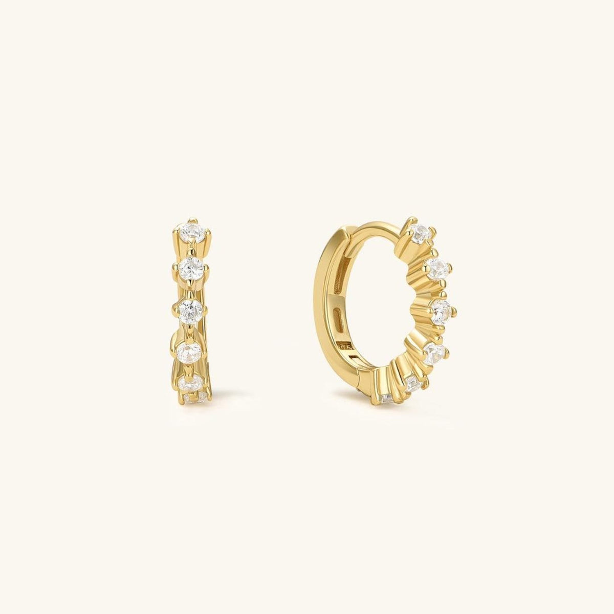 Gold-tone cluster diamond hoop earrings with clear stone clusters