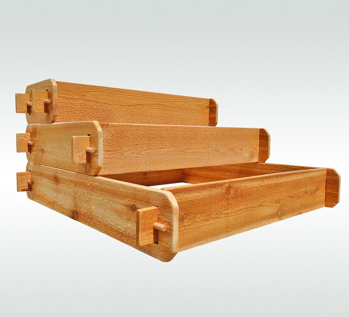 3-tier cedar raised garden bed kit showing stepped tiers and attached corner fasteners
