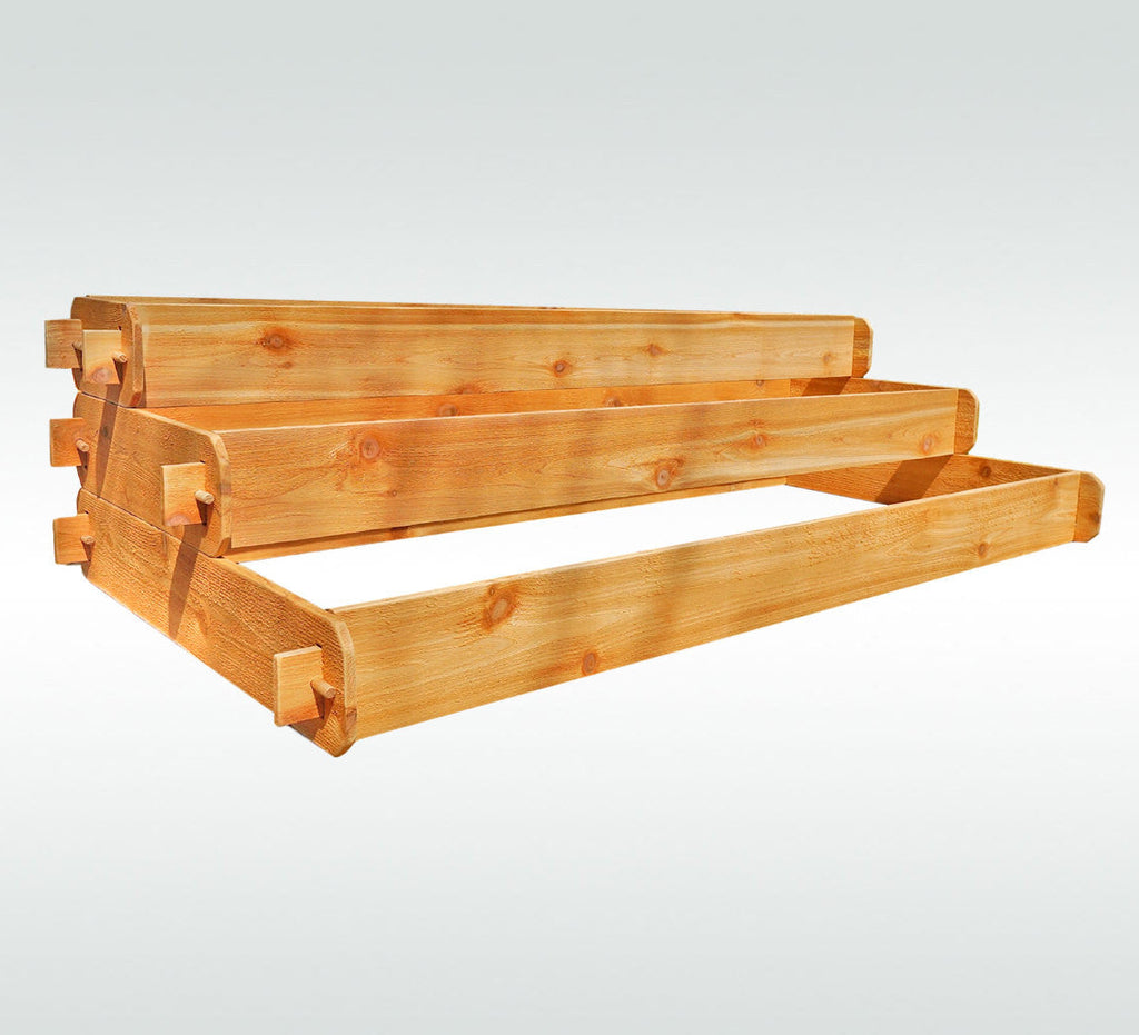 Three-tier cedar raised garden bed kit with three stacked rectangular planters and corner brackets