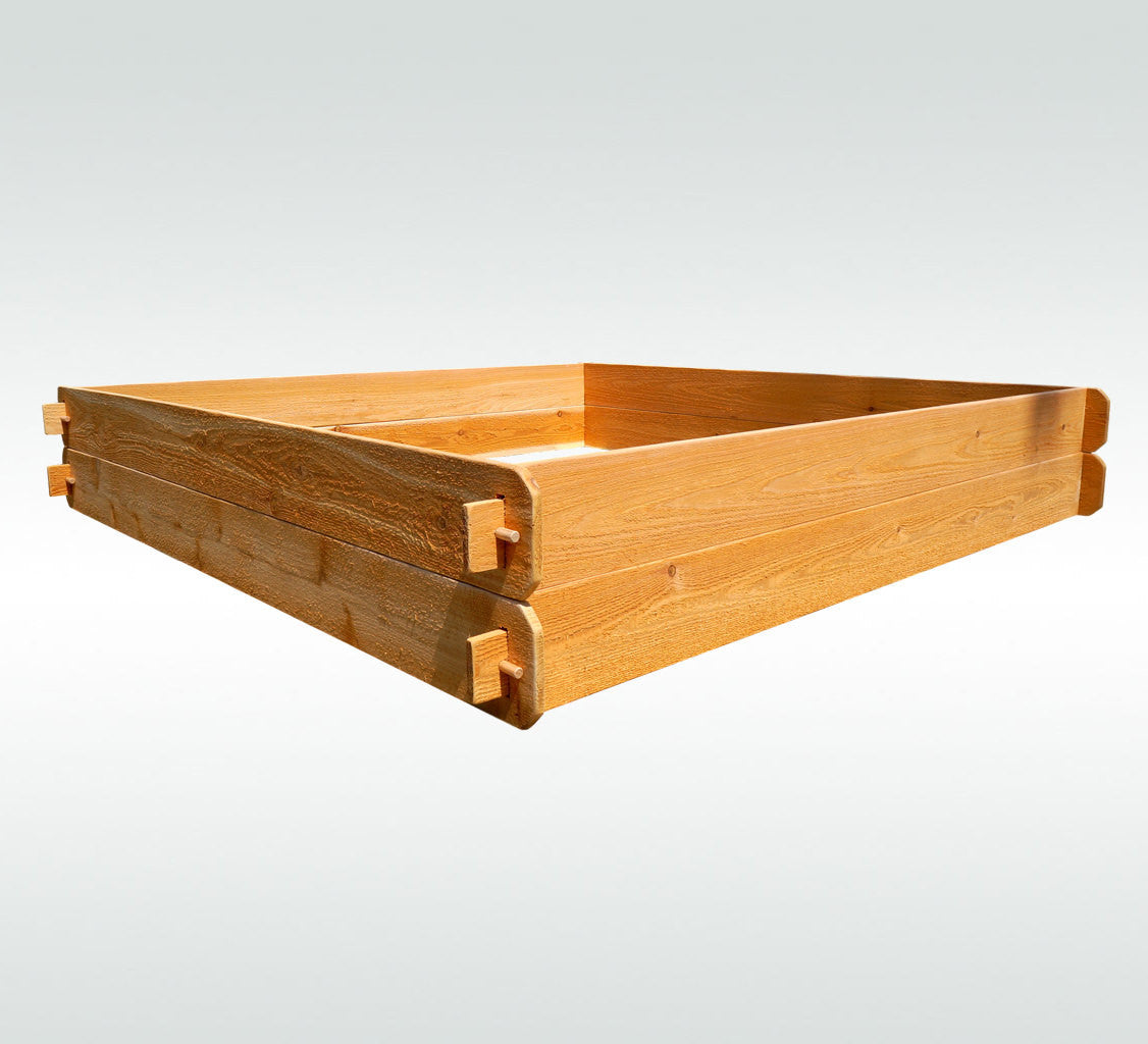 Cedar raised garden bed corner with interlocking support brackets and end joinery