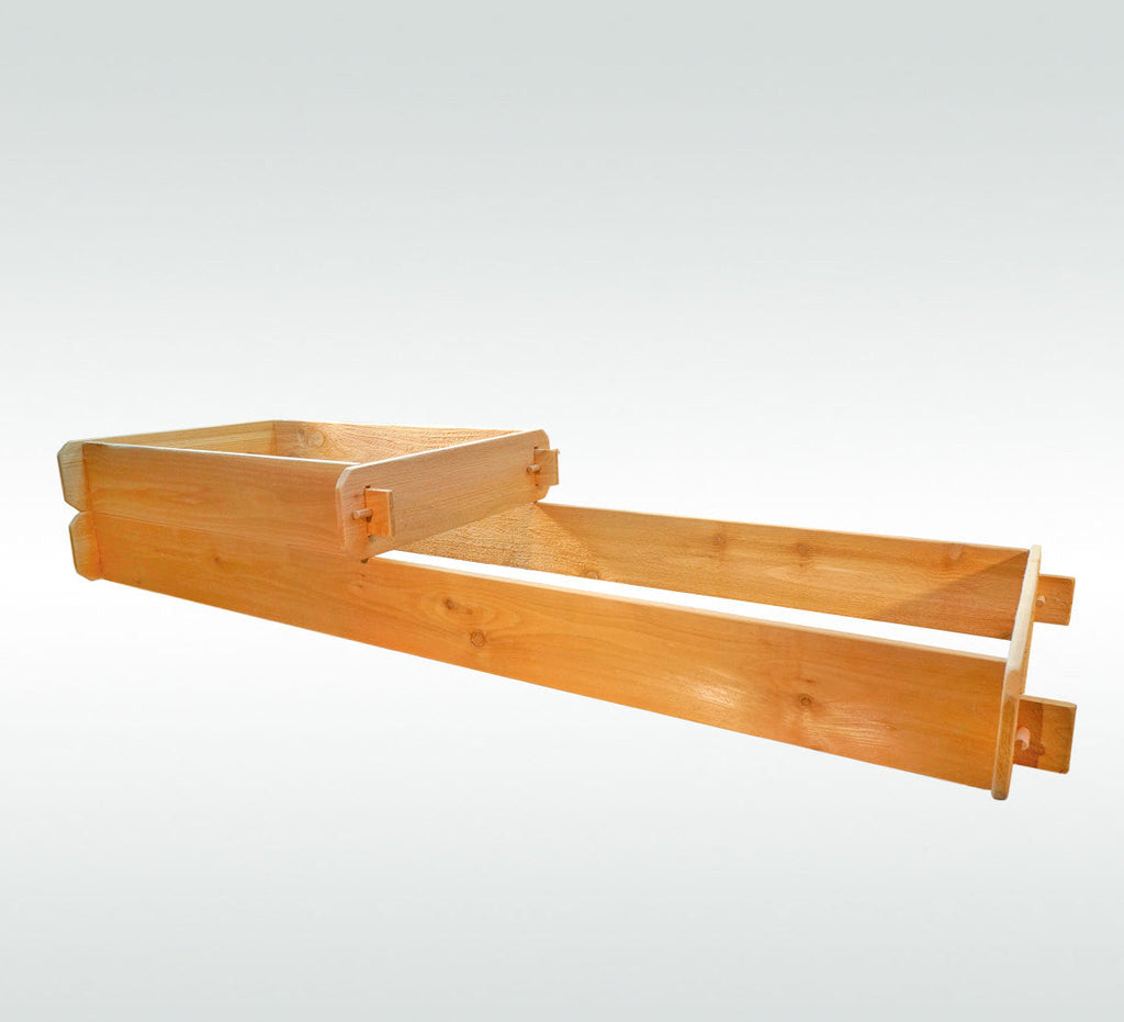 Two-tier raised cedar garden bed kit viewed from the side with end posts