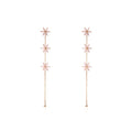 Rose gold sakura flower drop earrings with three dangling blossoms and chain
