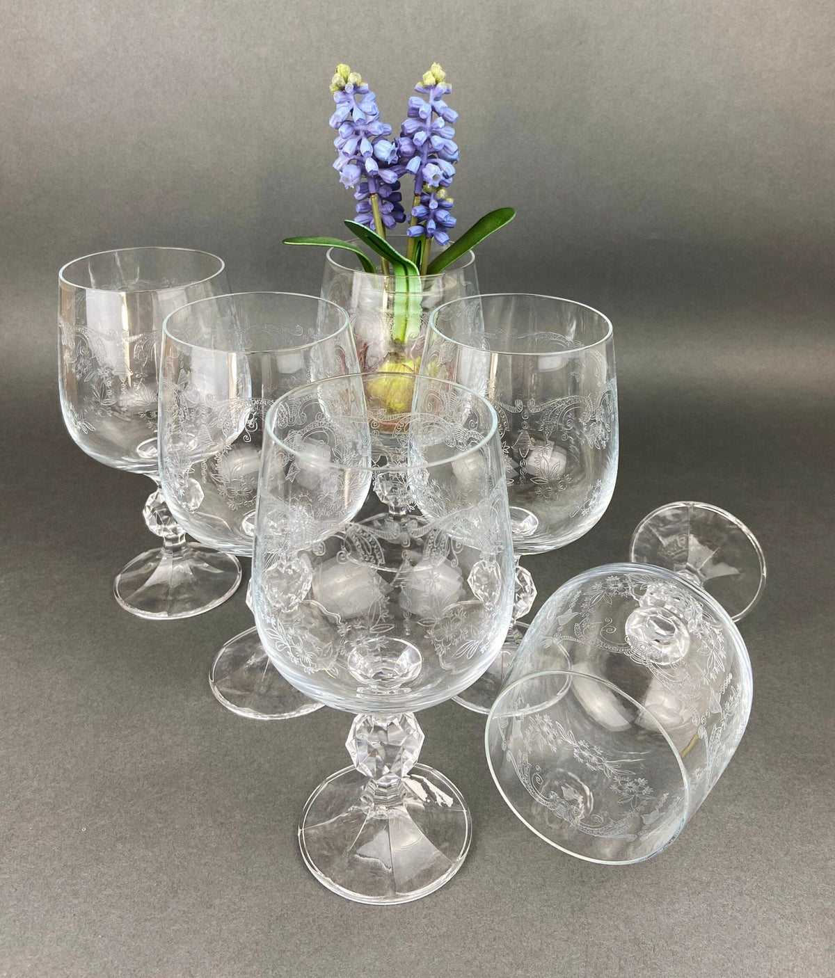 Set of 6 crystal goblets with etched bowls and faceted crystal stems