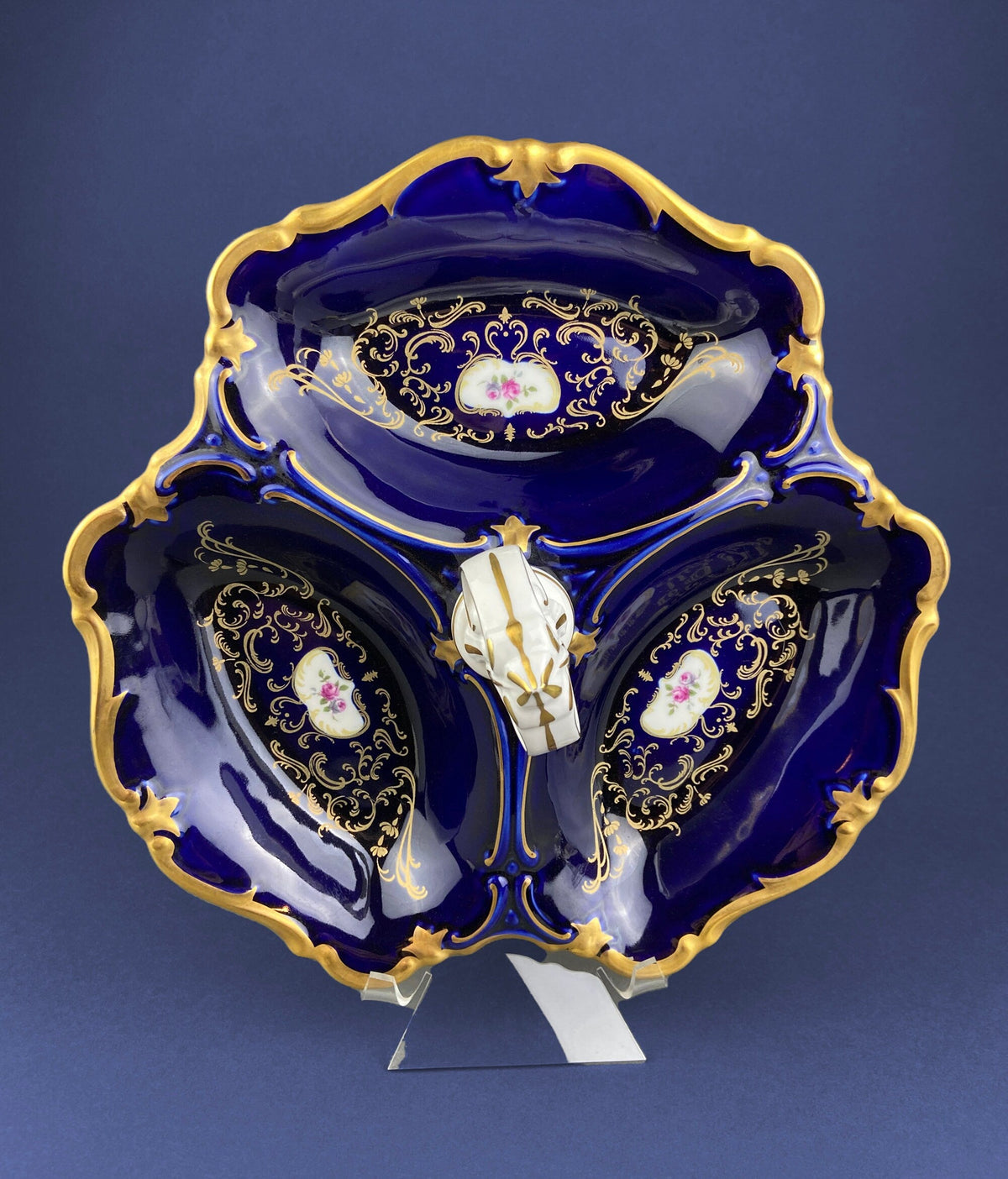 Porcelain divided serving bowl with handle, dark blue enamel and gold scrollwork