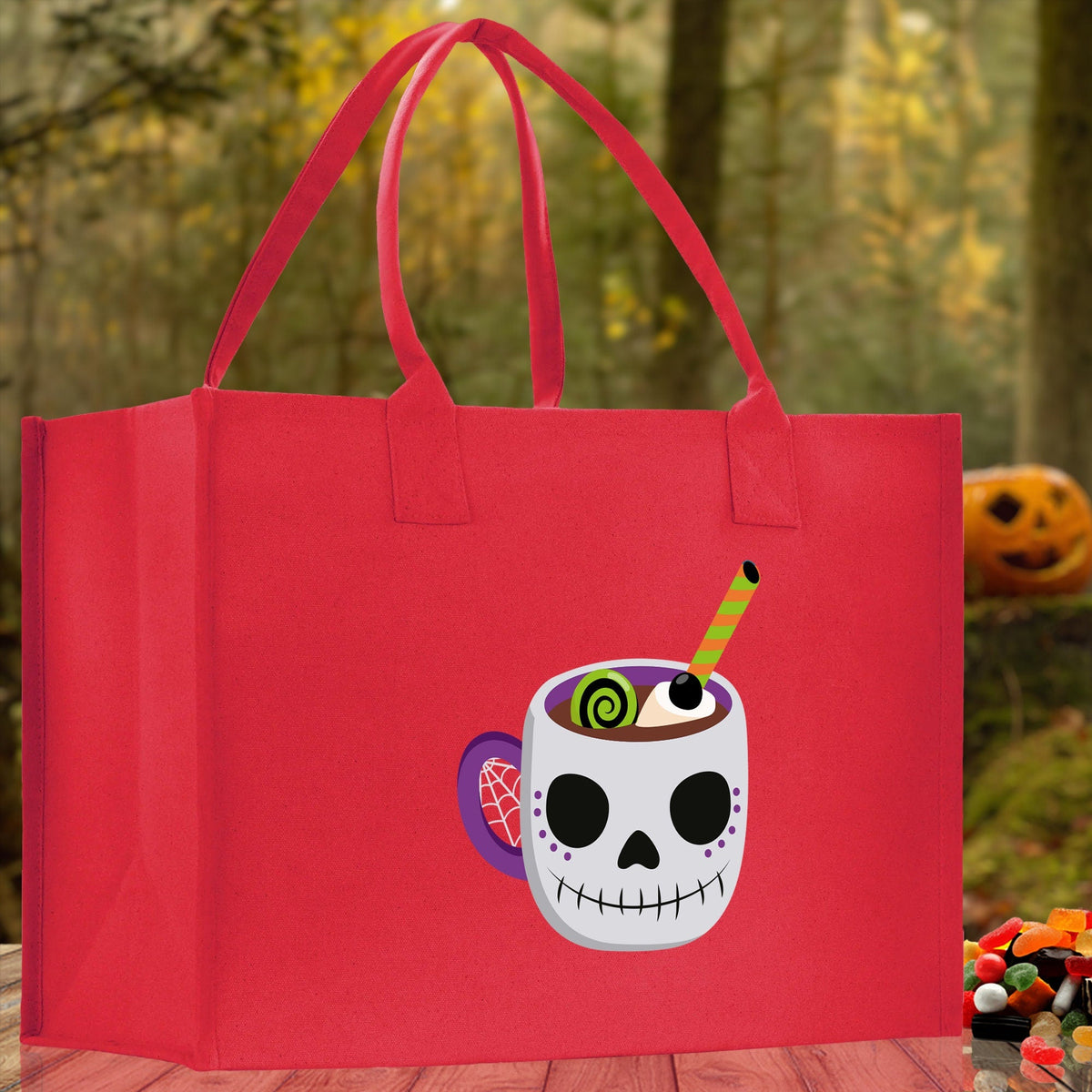 Red canvas Halloween tote bag for kids with smiling skull cup graphic and long handles