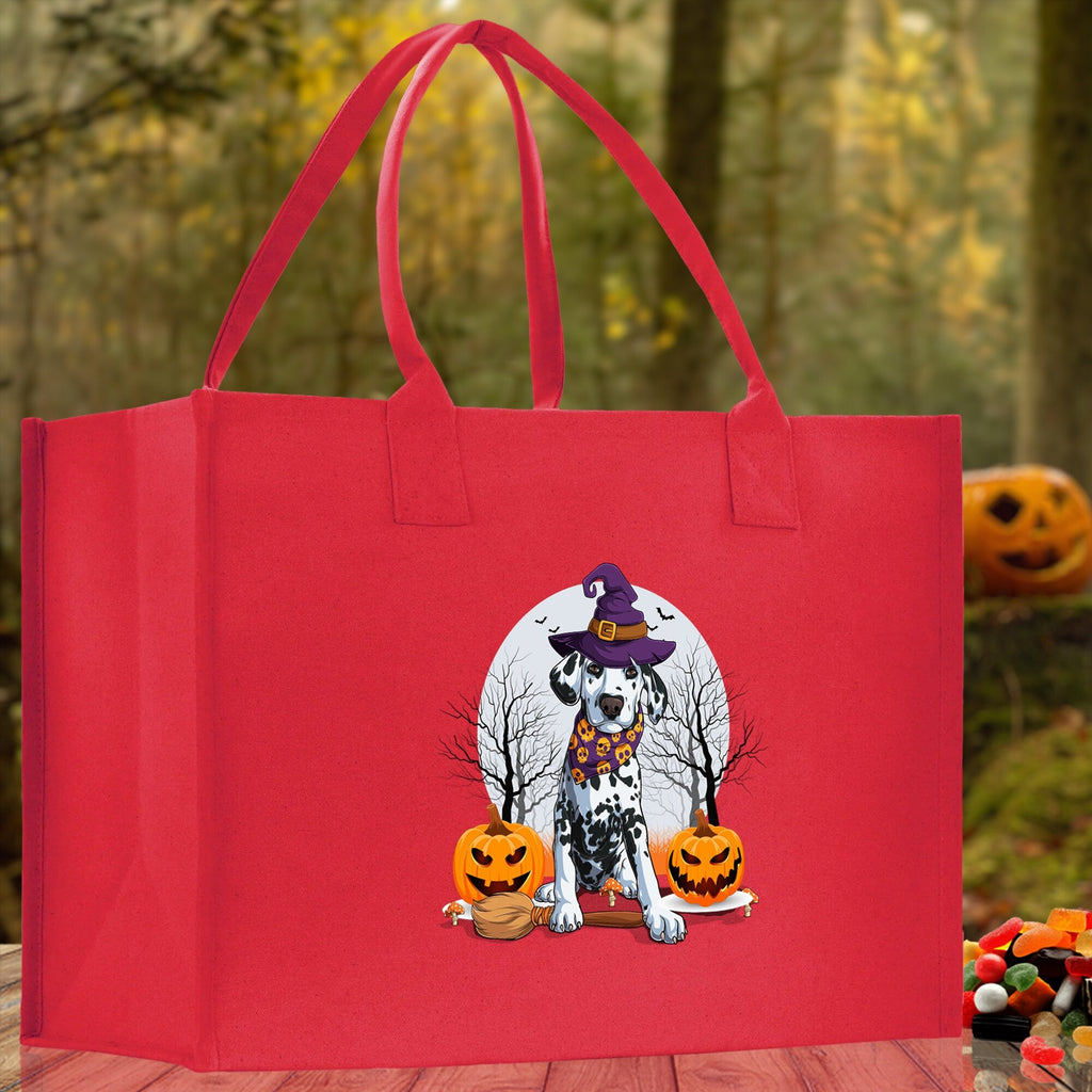 Red canvas tote bag with cartoon witch dog and jack-o'-lanterns on the front.