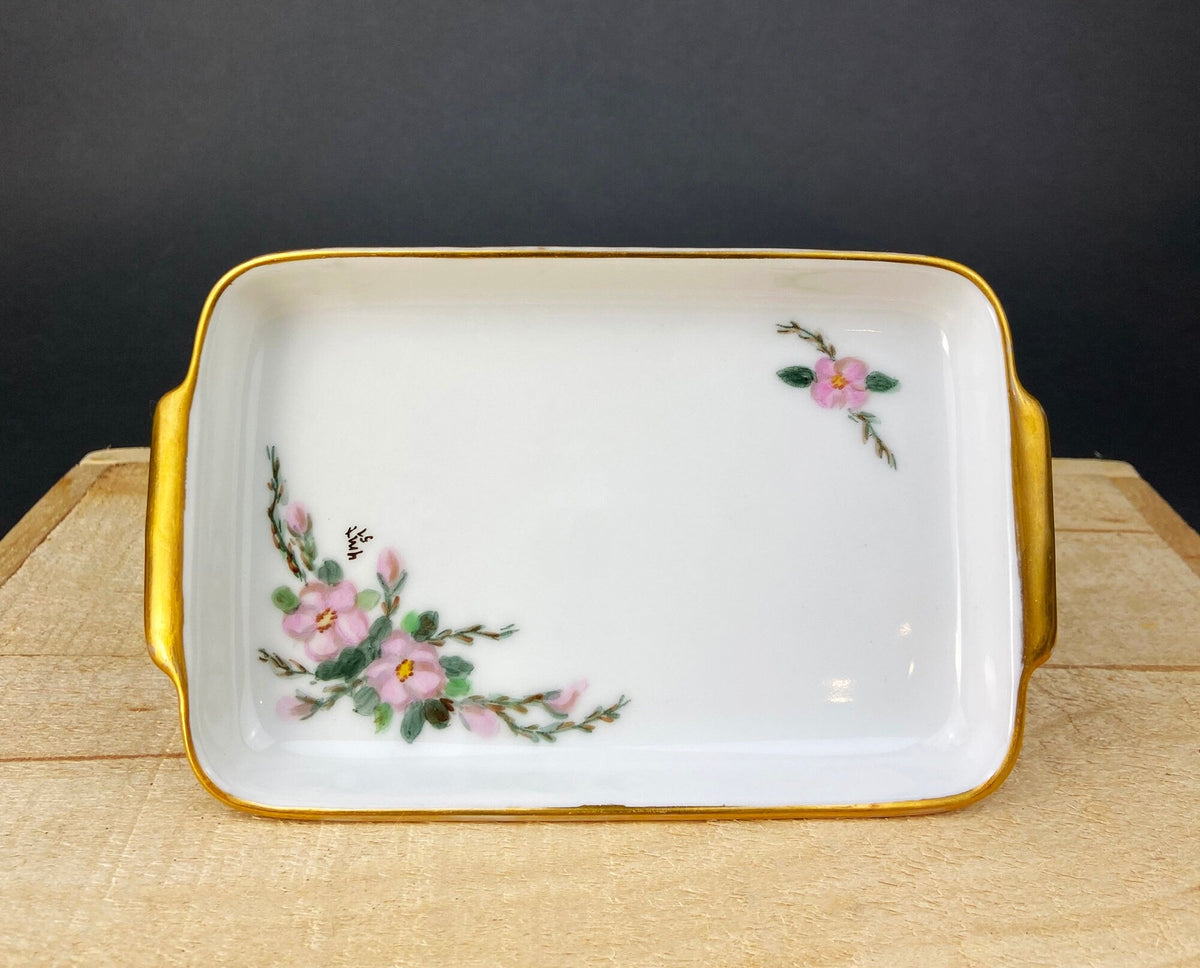 Porcelain rectangular serving tray with pink floral motifs and gold border