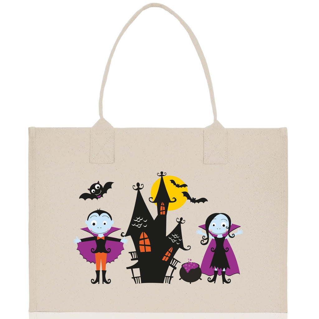 Natural canvas tote bag with Halloween character scene, centered on the front