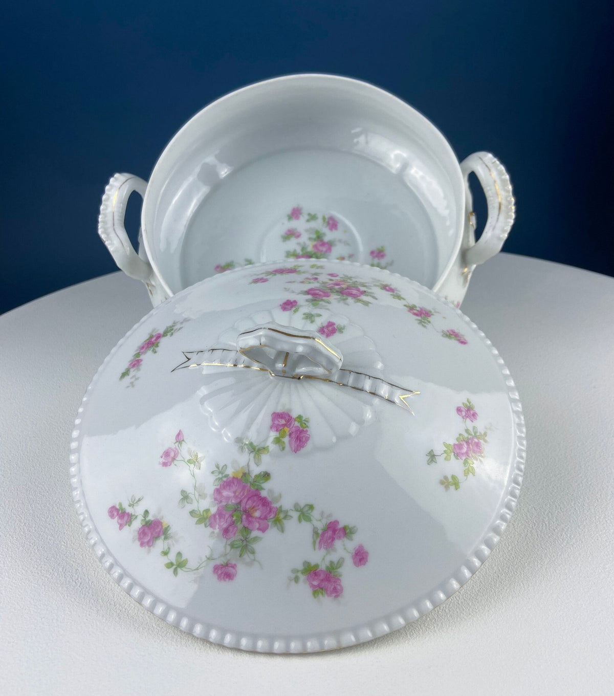 White porcelain soup tureen base with pink rose floral pattern and side bow handles