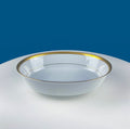 White porcelain oval serving bowl with gold embossed rim and thin gold band