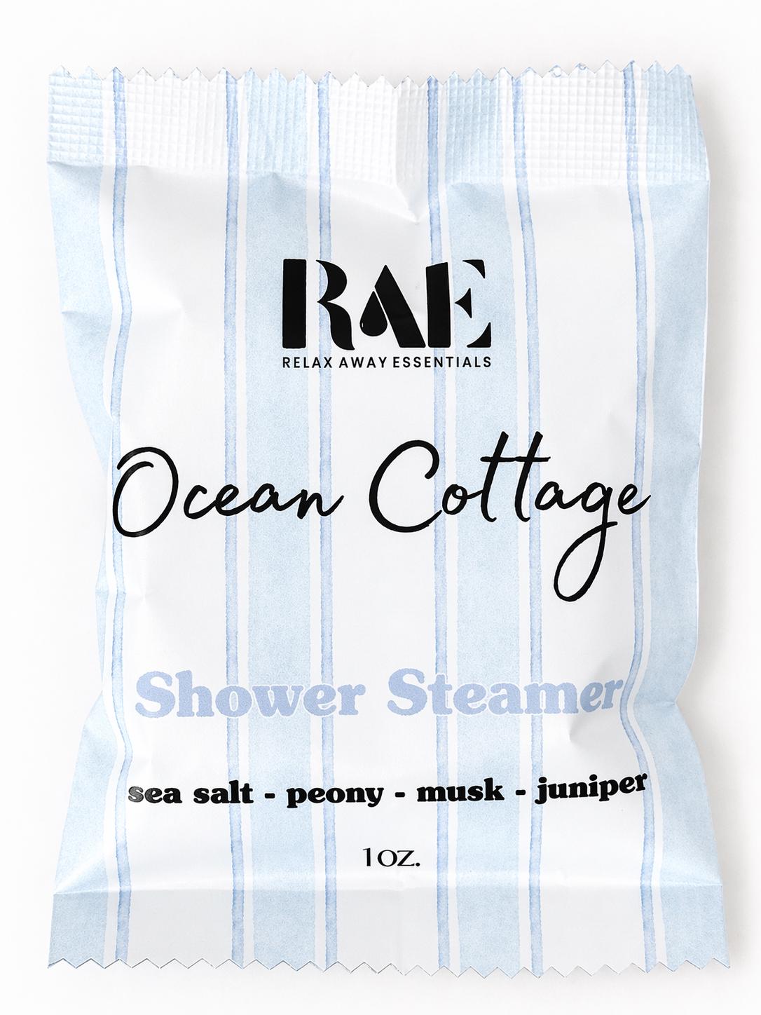 Ocean Cottage shower steamer pouch, white striped packet with RAE logo and scent notes