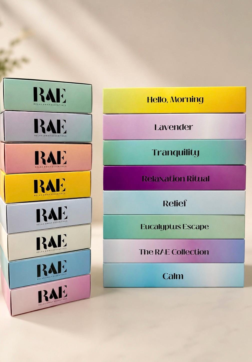 RAE shower steamer 6-pack lineup with multiple colored boxes labeled flavors