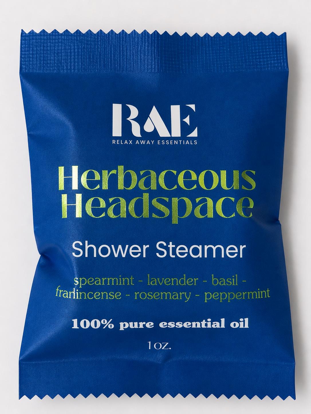 Blue shower steamer packet with BAE logo and herb-scent ingredient list, 1 oz