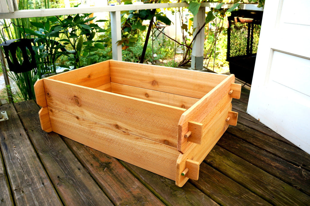 Cedar raised garden bed kit with double-deep long side and corner legs