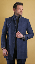 Men's deep blue double-breasted overcoat with notched lapels and flap pockets.