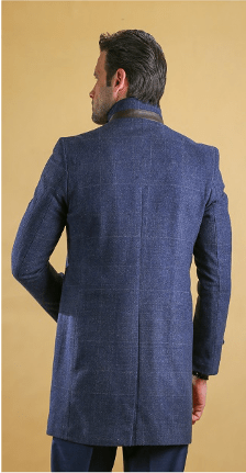 Deep blue overcoat back view with center back seam and hem vent.