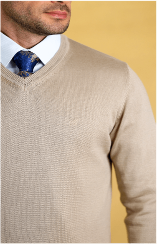 Tan v-neck sweater close-up of ribbed collar and knit texture