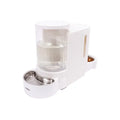 White double pet food and water dispenser with clear sections and stainless bowls