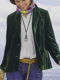 Dark green velvet blazer with notch lapels, front buttons, long sleeves