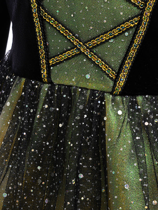 Green bodice with gold trim and crisscross chain straps over black glitter skirt
