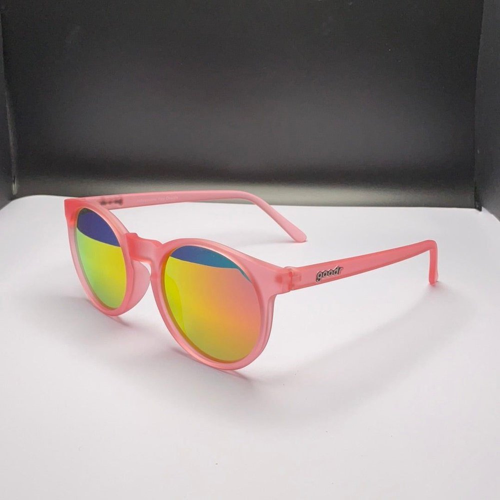Pink sunglasses with rainbow mirrored lenses and straight temple arms