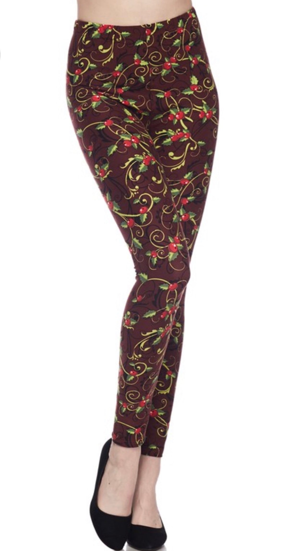 Plus-size holiday holly print leggings in dark burgundy with red green swirls