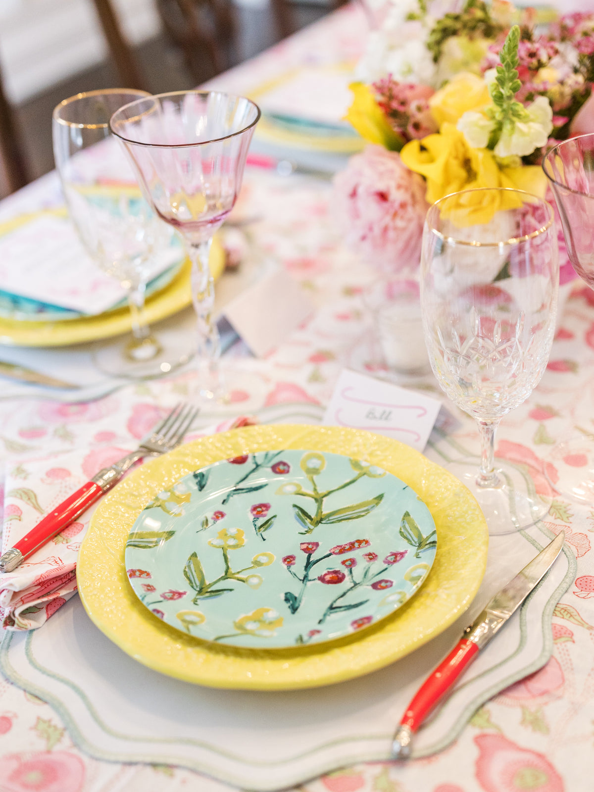 Yellow-rim botanical china plate with leaf-and-flower design