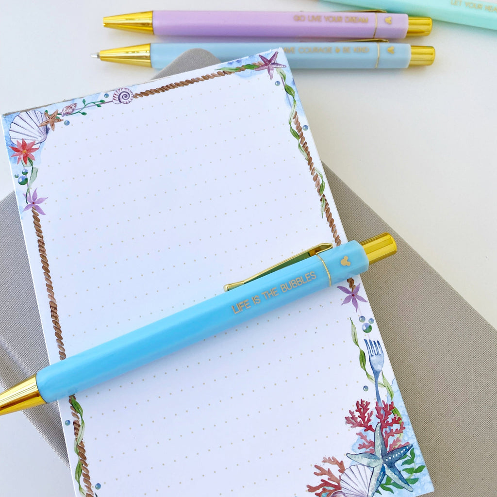 Sea-themed memo notepad pages with coral frame and dotted writing grid