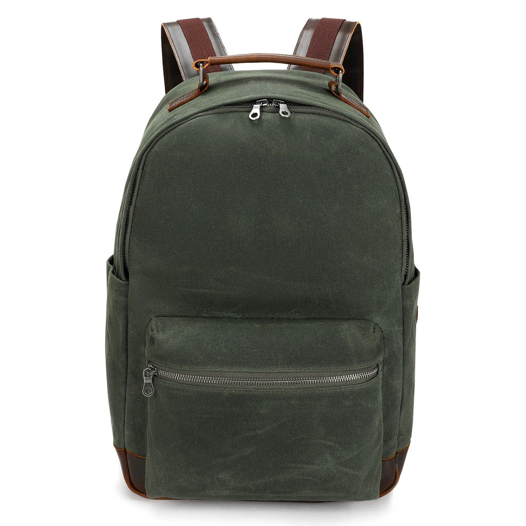 Dark green canvas backpack with brown leather straps and front zipper pocket