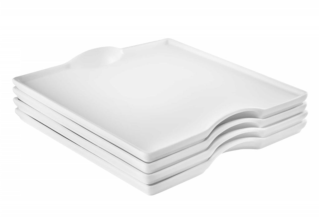Stacked white square porcelain plates with rounded corners