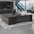 L-shaped office desk with return, dark finish, built-in storage shelves and drawers