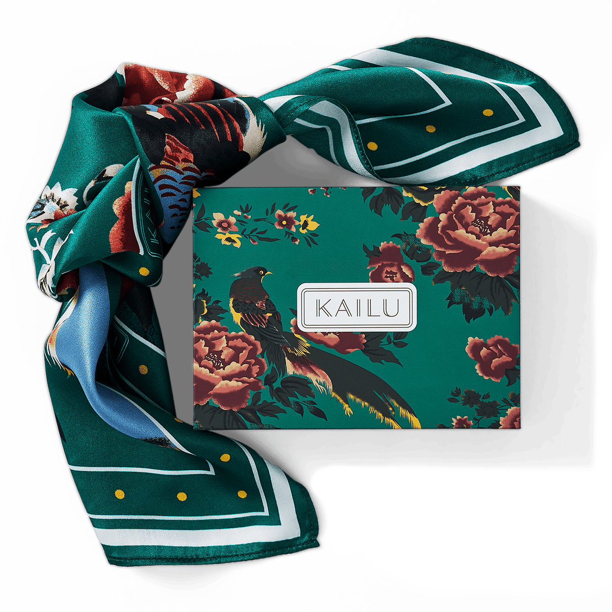 Teal silk scarf tied in a knot with floral bird print and gold dotted trim