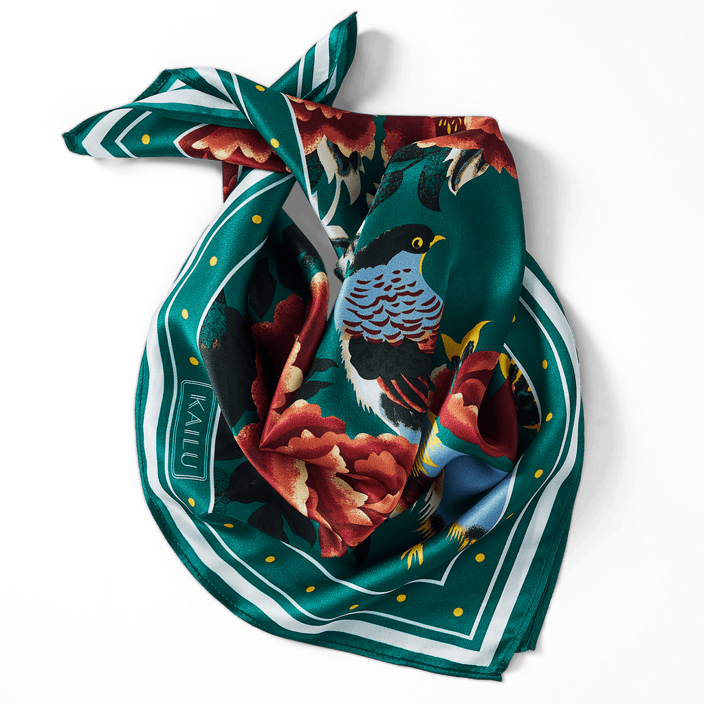 Teal silk scarf with bird and floral pattern, bordered with white and green stripes