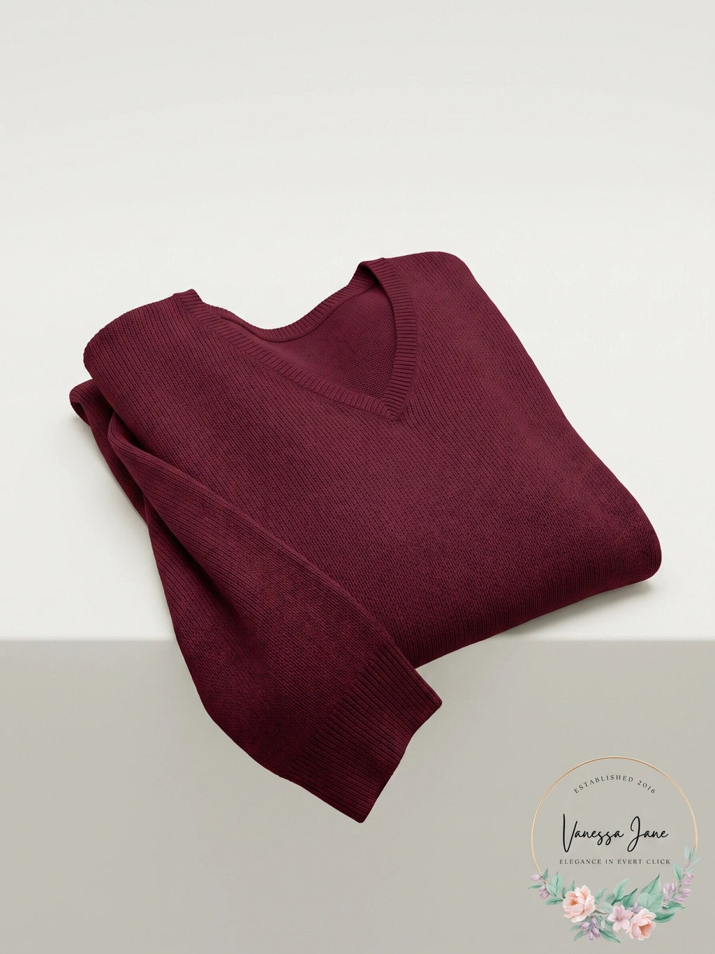Burgundy cashmere v-neck sweater, folded