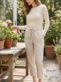 Pale sand pull-on linen-blend pants with elastic waist, drawstring tie, cropped ankle