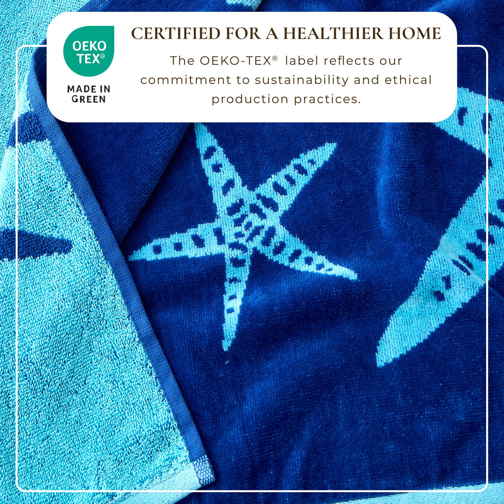 Cotton velour beach towel in blue with large starfish motif