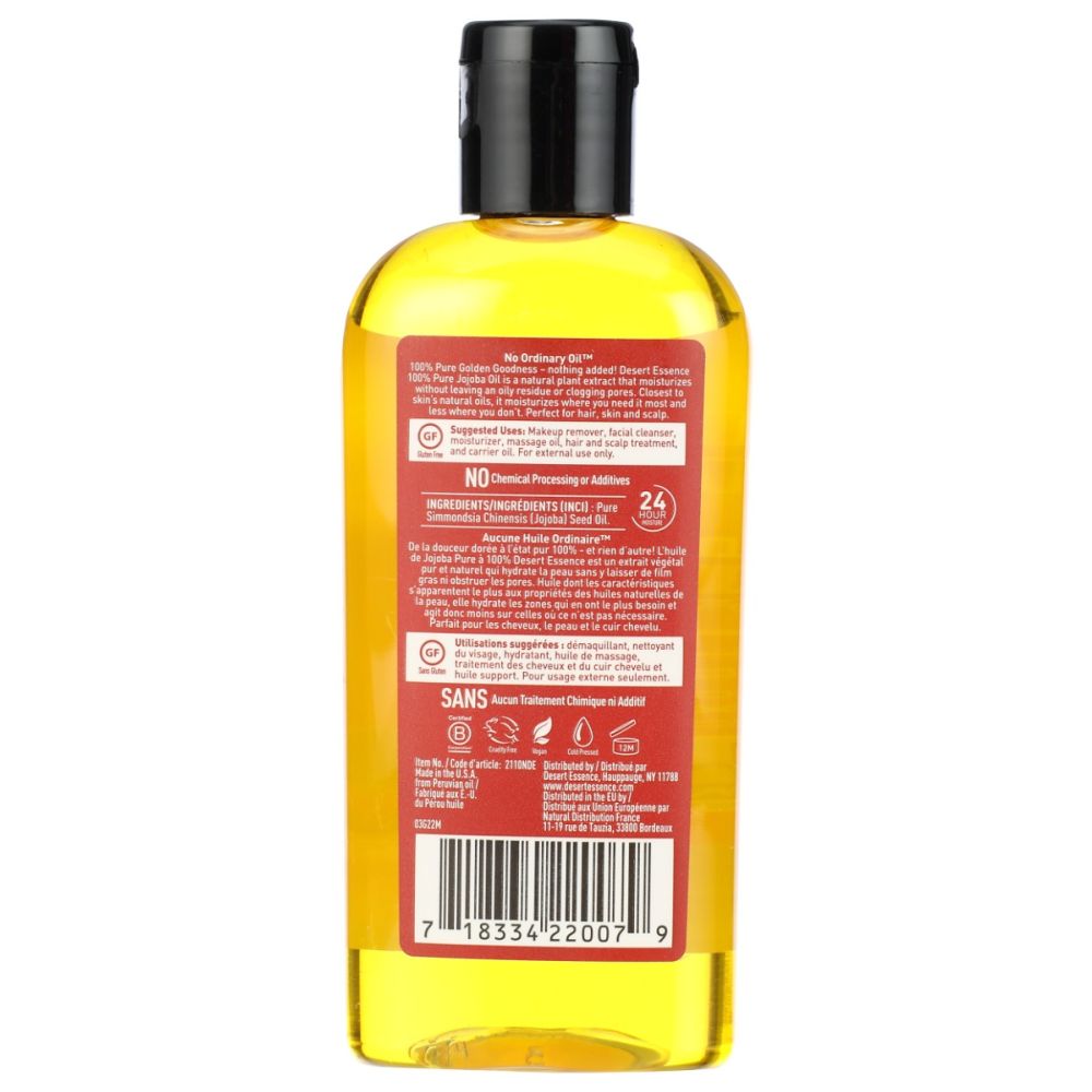 Jojoba oil bottle with black cap and back label, yellow liquid