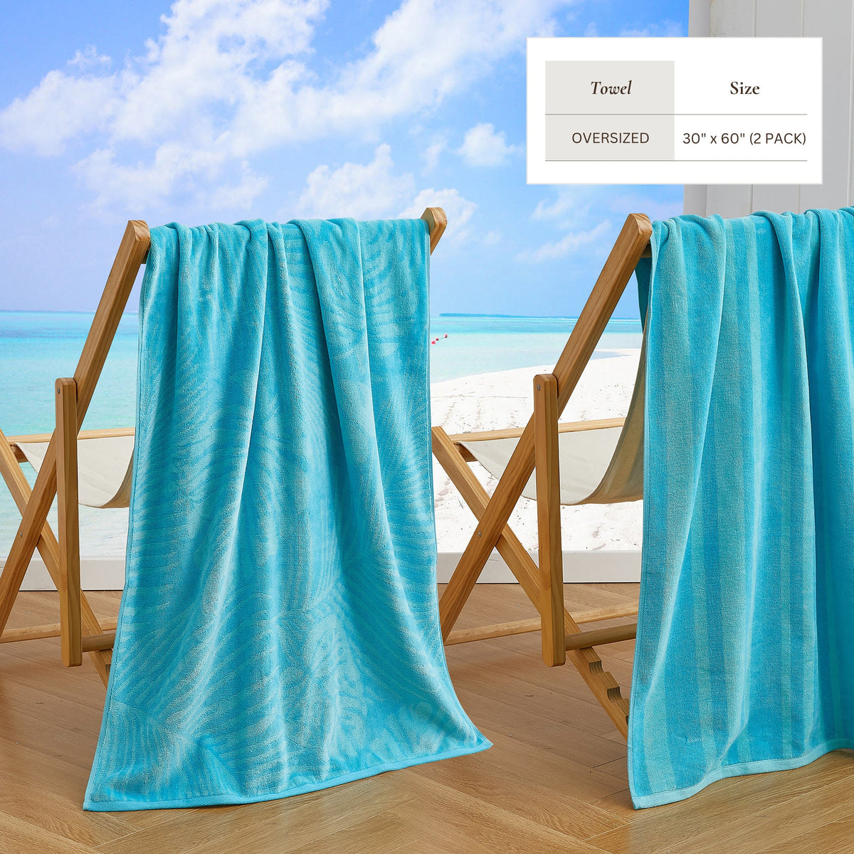 Turquoise cotton velour beach towel over two beach chairs, subtle pattern