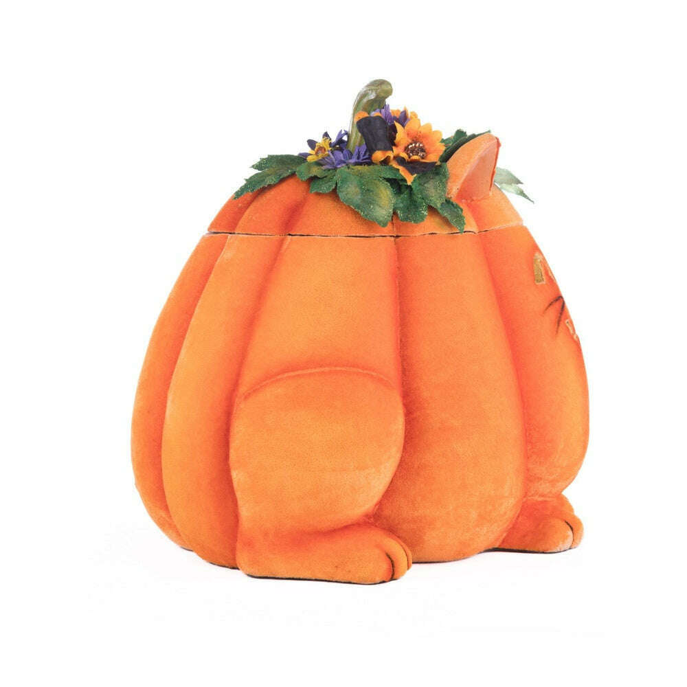 Orange plush pumpkin cat candy container with green leaves and carved jack-o-lantern face