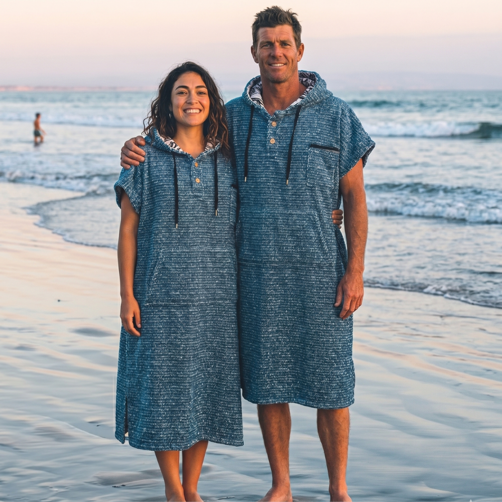 Heathered blue wearable blanket hoodie with hood, short sleeves, and front pocket