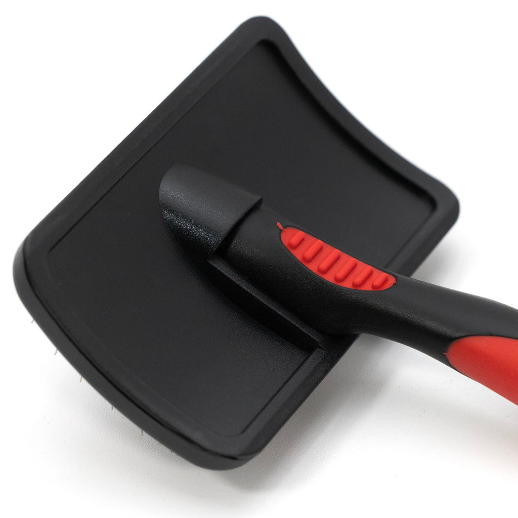 Pet grooming brush head with dual tool slots; black base with red accents