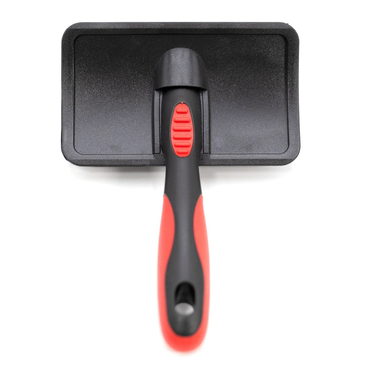 Firm-pin slicker brush with textured rubber backing and red button-like grip detail