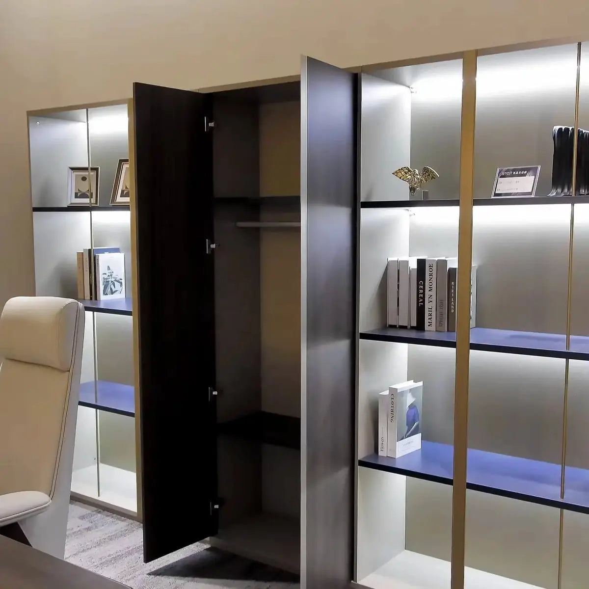 Beige shelving unit with LED-lit compartments and open side door storage