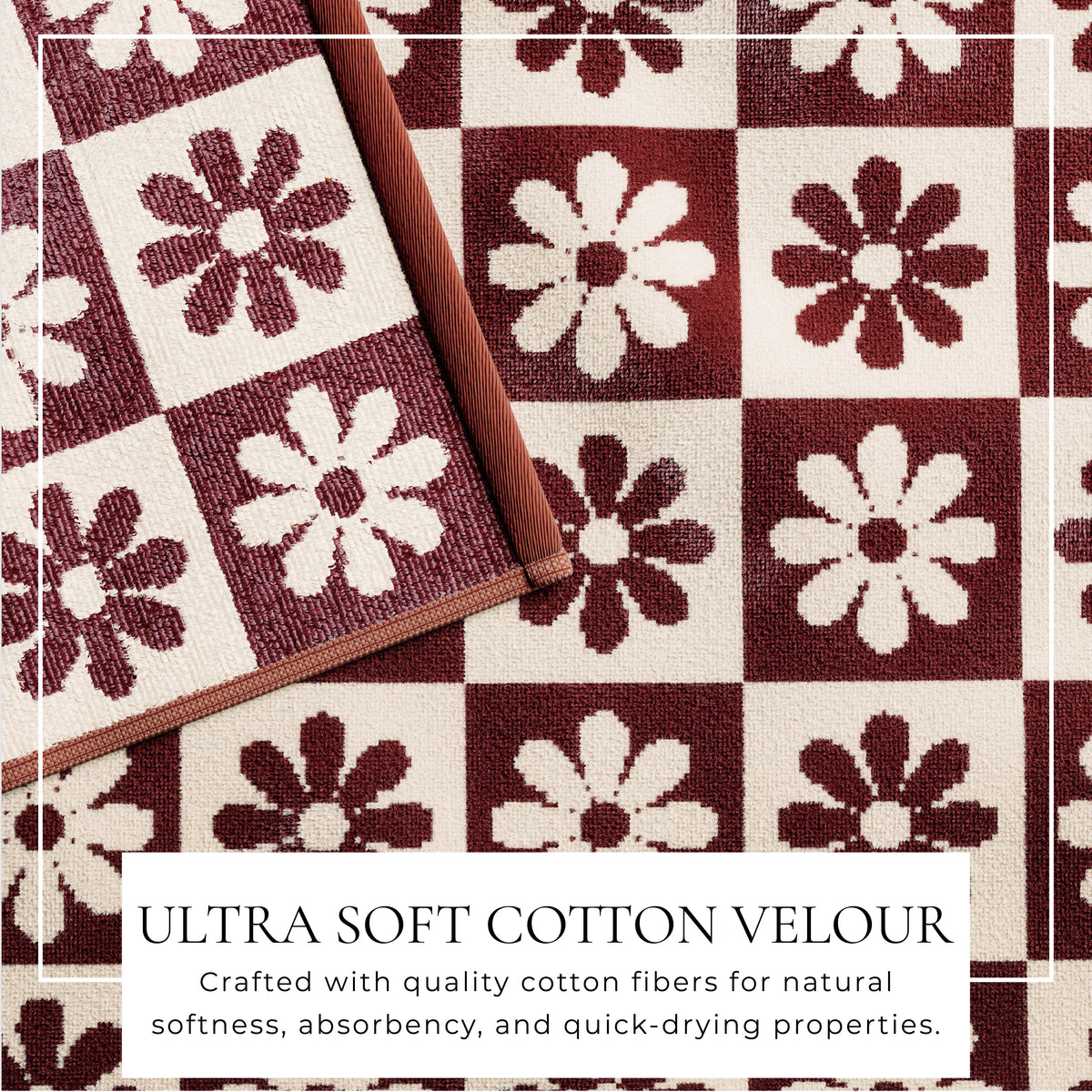 Cotton velour beach towel with maroon and white flower pattern, bordered.