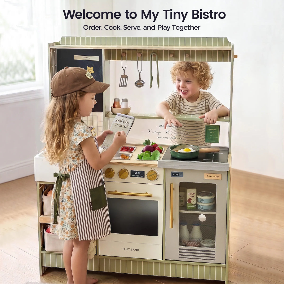 Kids play bistro kitchen with stovetop, oven, sink, and storage shelves