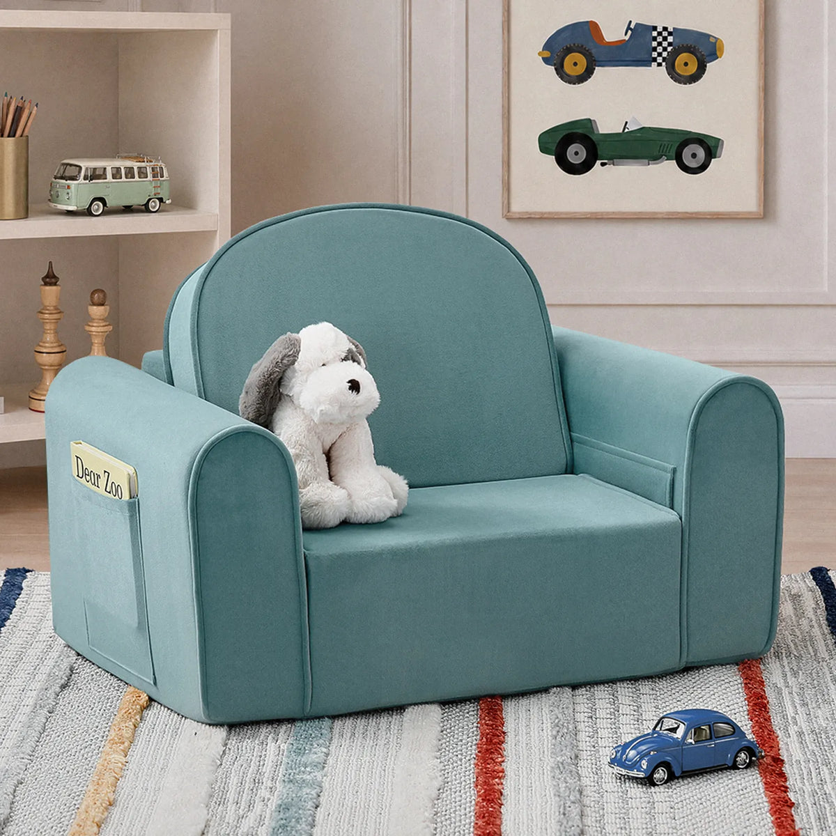Kids sofa chair in teal-blue fabric with rounded back and arms