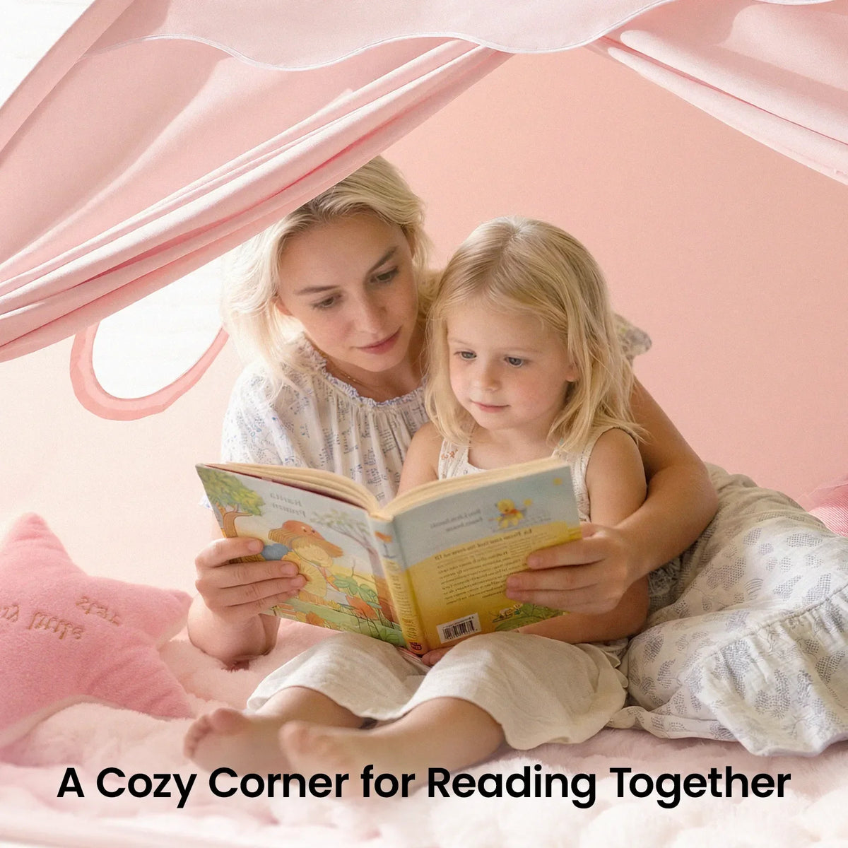 Pink kids tent with breathable top and child reading inside