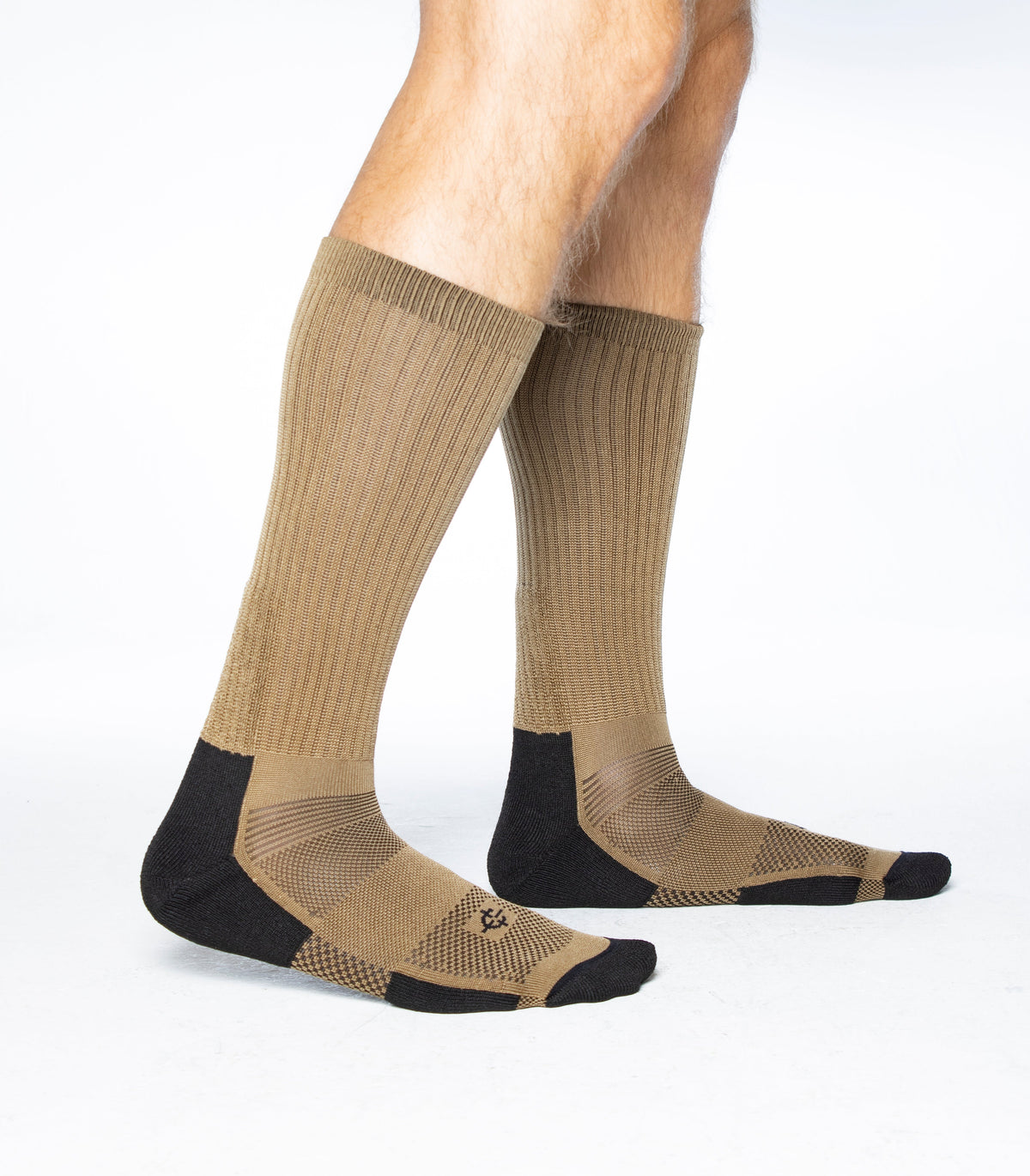 Coyote brown crew socks on feet with black heel-toe and mesh panels