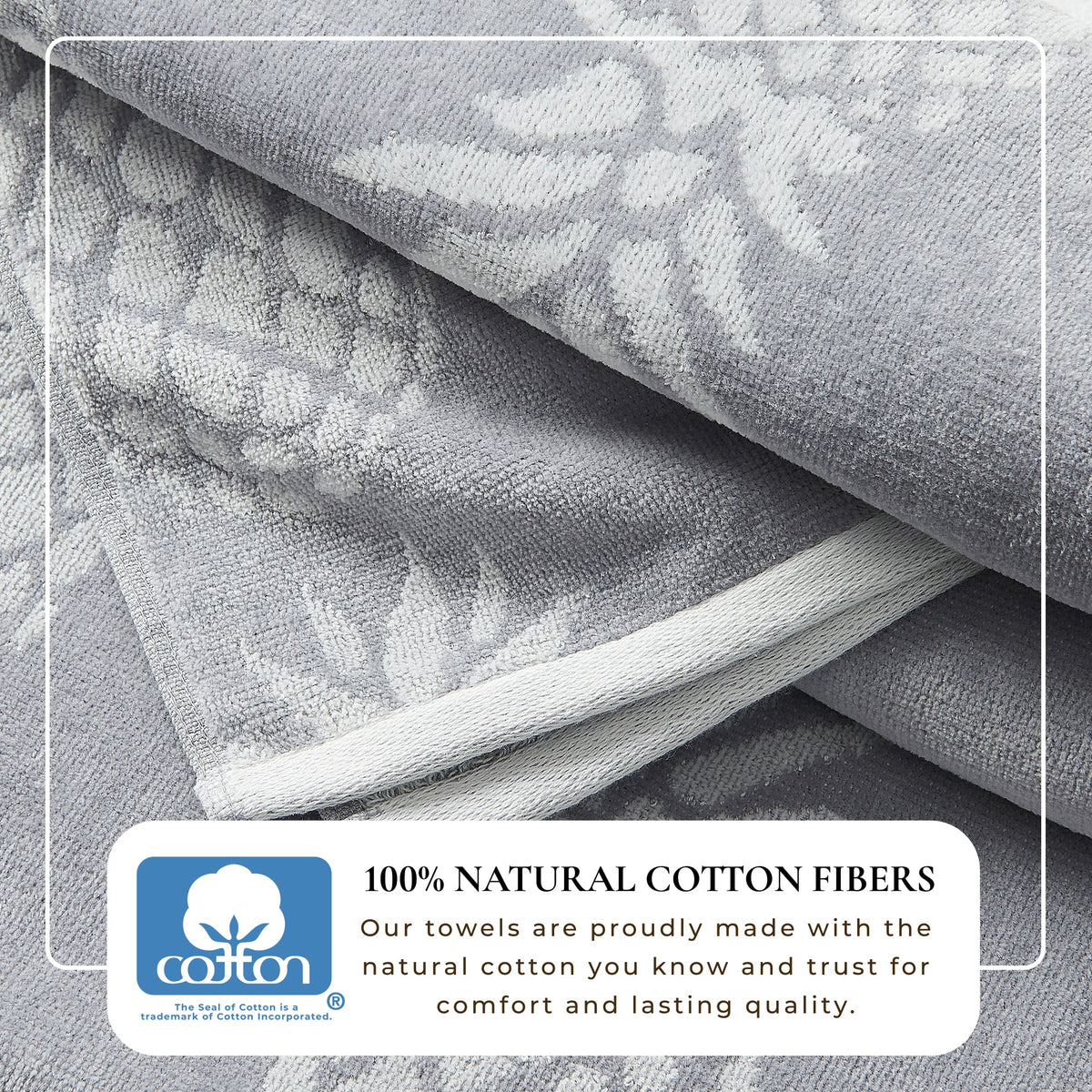 Gray cotton velour towel fold with white motif pattern and soft edging